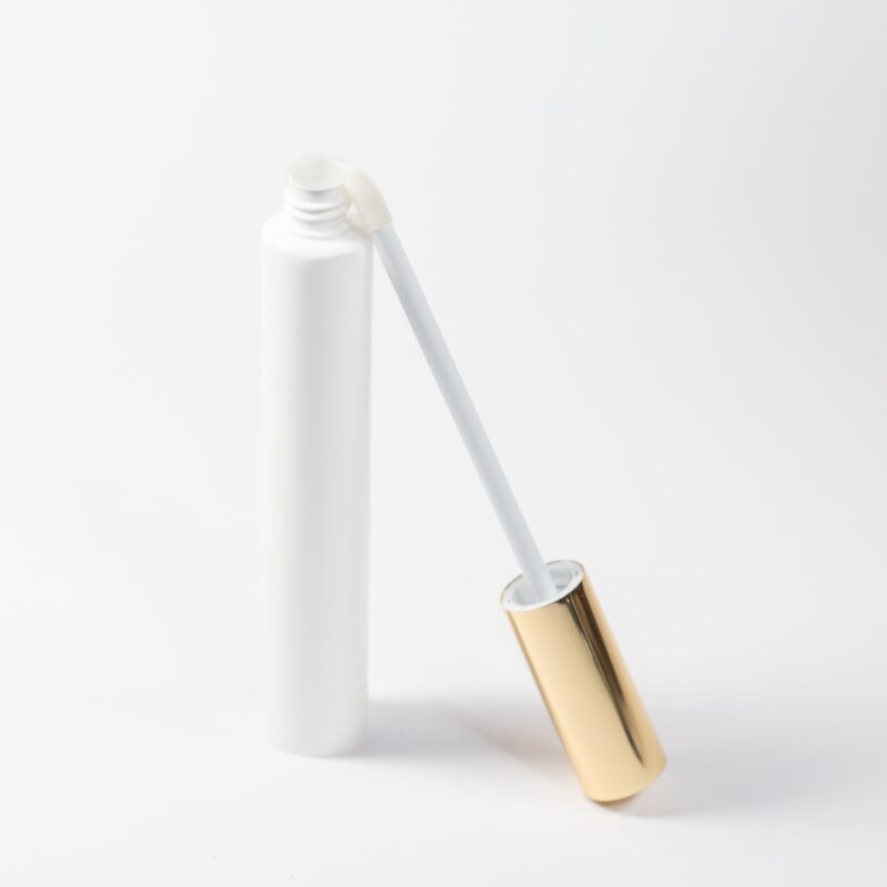 Tubo colapsible brillo labial con aplicador